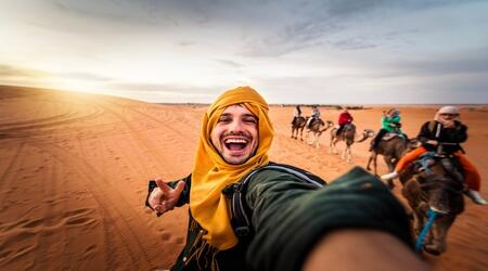  Abu Dhabi: Desert Safari with BBQ Dinner, Camel Ride & Sandboarding