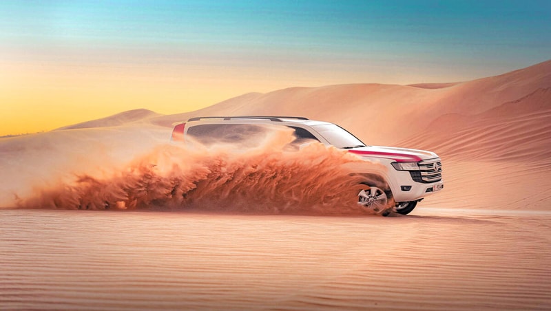 Desert Safari with BBQ Dinner, Camel Ride & Sandboarding City Pass